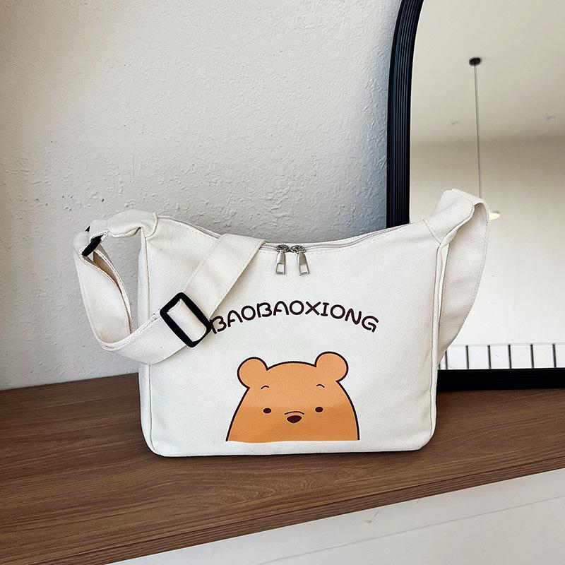 

Printed large-capacity letter cartoon canvas bag female popular universal versatile messenger commuter tote bag