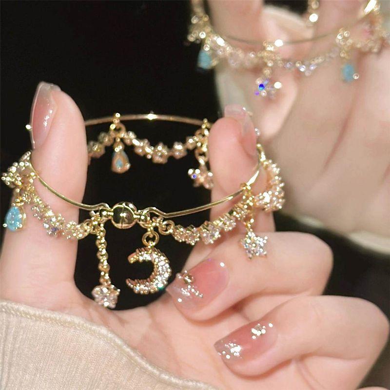 

Exotic Style Golden Metal Tassel Arm Bracelet Greek and Egyptian Style Jewelry for Women European and American Exaggerated Bracelet Jewelry Star and Moon Bracelet