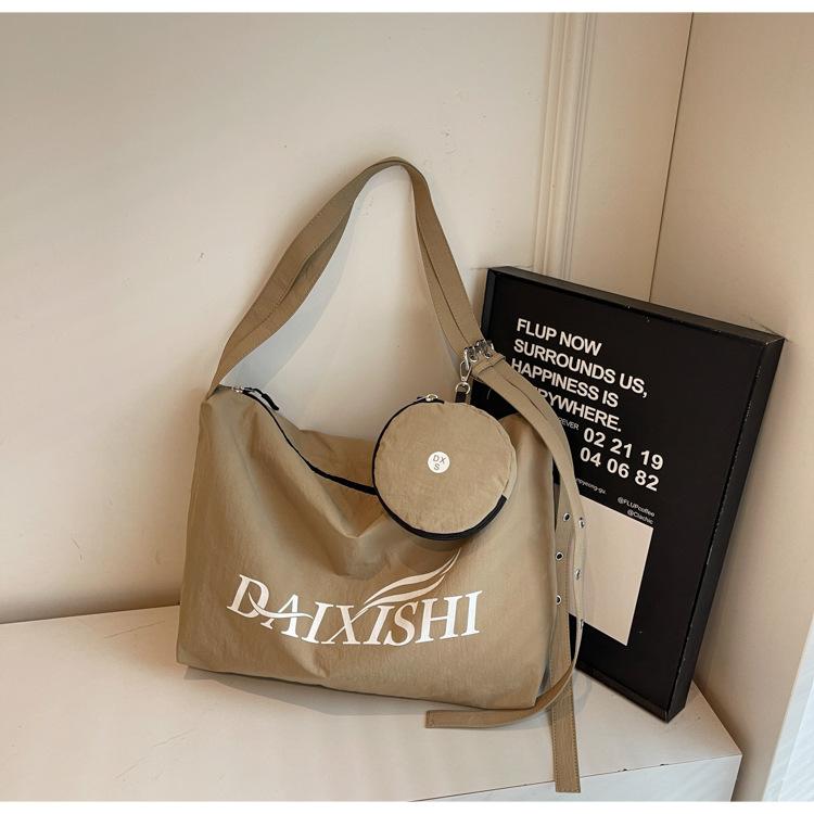 

2025 Alphabet Student Bag Women s Large Capacity Fashion Trend Shoulder Bag Premium Texture Commuter Tote Bag хаки