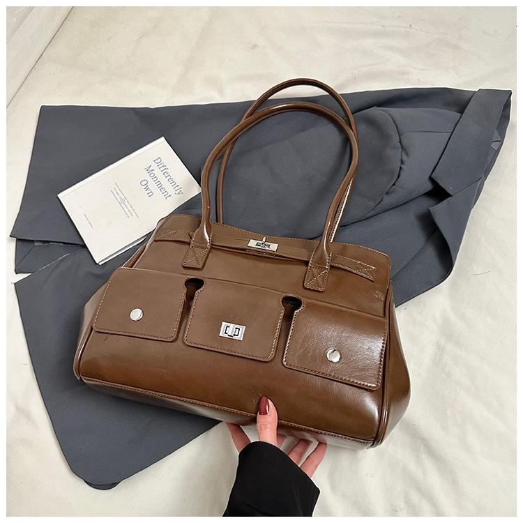 

Wholesale hot sale European and American retro business commuter style postman briefcase bag women s high sense versatile fashion shoulder bag