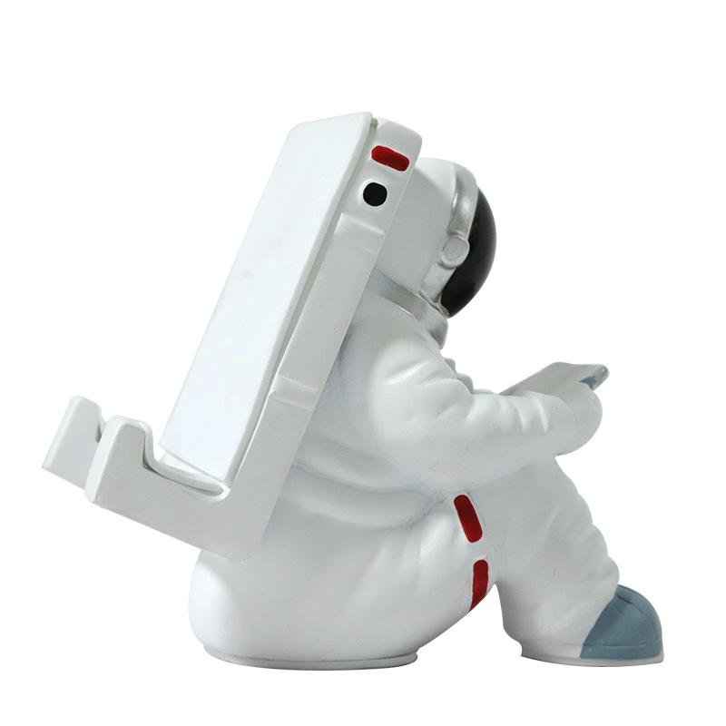 Cartoon Astronaut Telefoonhouder: Creatief Hars Ornament & Tabletstandaard voor Bureau