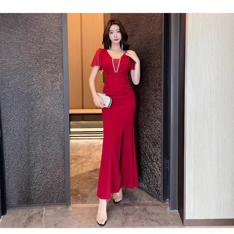 Nightclub sexy dress women's foot bath overalls show deep V-neck low-cut split hip-wrapped long dress