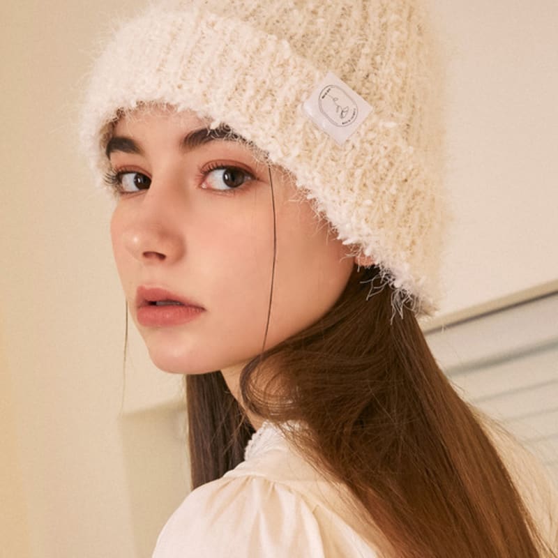 

EVERY FLOWER LUMPY IVORY BEANIE free