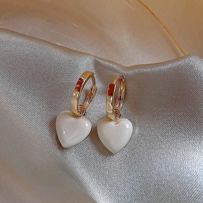925 Sterling Silver Korean Version Fashionable Fresh Classic Heart Earrings Peach Heart Simple Fashion Retro Earrings Women's Earrings
