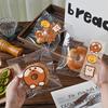 100Pcs 17x17cm Clear Transparent Bread Bags Toast Cake Printed Snack Bread Coffee Shop Food Packaging