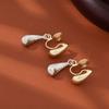 Pearl Mosquito Coil Disc Ear Clips: No-Pierce, Elegant French-Style Earrings for Women
