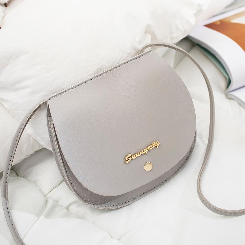 Women's bag  new Japanese and Korean style fashion simple shoulder saddle bag small fresh mobile phone change shoulder