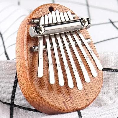 1Pcs Wood Mini Thumb Piano Musical 8 Tones Portable Beginner Finger Piano Kalimba Musical Instruments