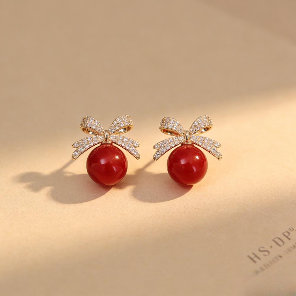 Fashionable Bow-shaped Pearl Stud Earrings New Hit Item Light Luxury High-end Niche Style Small-sized Sea Shell Pearl Earrings