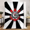 Black and white radial stripes with a detailed red and white emblem. for all seasons blanket lunch break throw gift