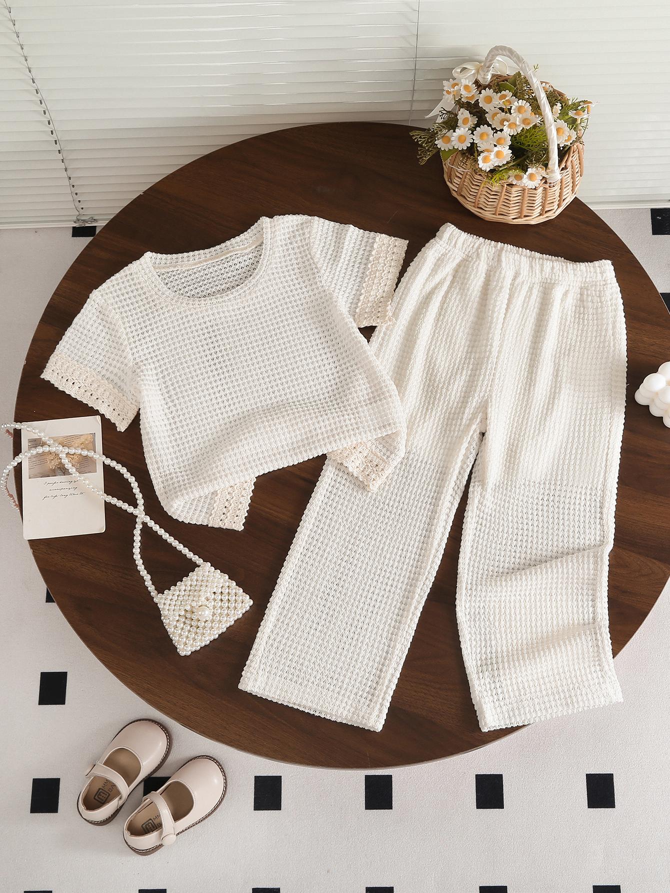 

Girls 2-Piece Fashion Vacation Outfit: Crew Neck Short-Sleeve T-Shirt with Ruffled Cuffs & Loose Wide-Leg Pants Set (Spring/Summer) 4Y