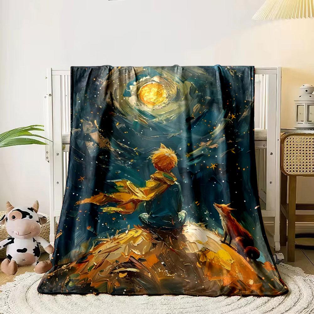 Swirling galaxy with golden moon, boy in scarf, and fox on a hill. for all seasons blanket lunch break throw gift