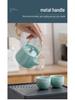 Portable Ceramic Kung Fu Tea Set: Teapot with Handle and Four Cups for Travel and Business Gifting