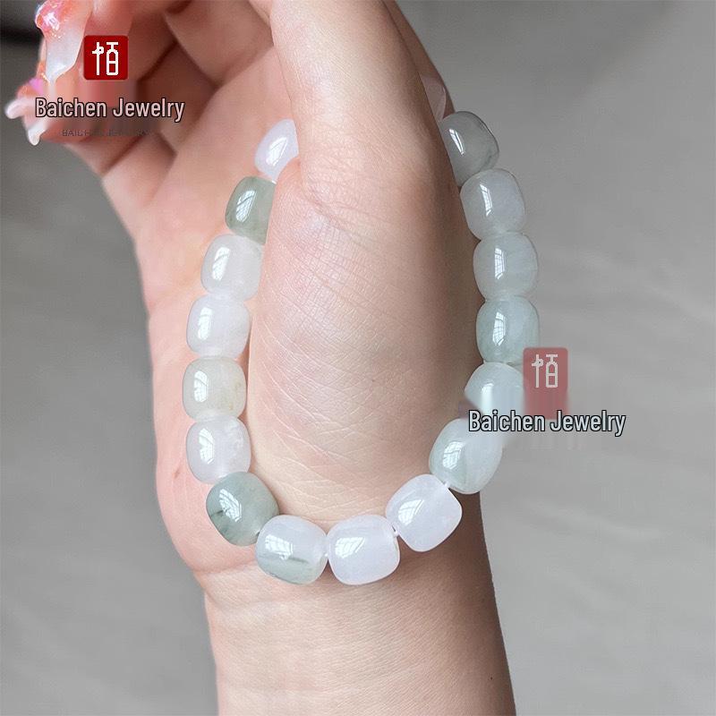 Golden Silk Jade Bracelet: Women's Xinjiang Tianshan Green Jade with Floating Flower Design and Barrel Beads.