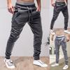 Herren Kordelzug Reißverschlusstaschen Knöchelbund Sweatpants Sporthose Skinny Hose