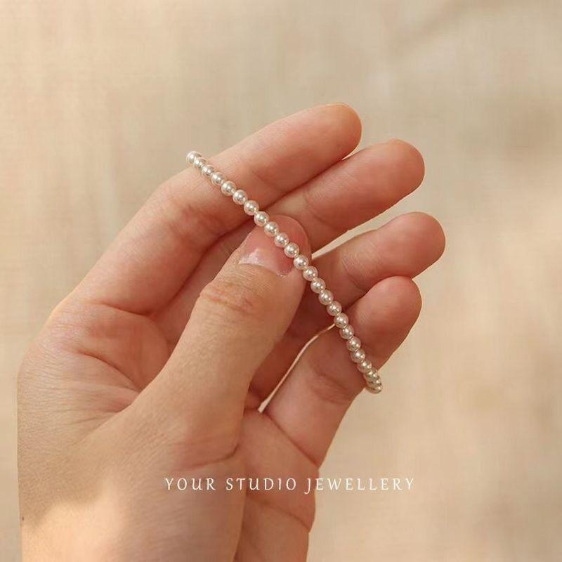 

Браслет из искусственного жемчуга женский на эластичной нити ретро изысканный необычный жемчужный браслет ручной работы украшение 2024 новинка браслет 16cm 4mm Extremely Fine Imitation Pearl Rice White