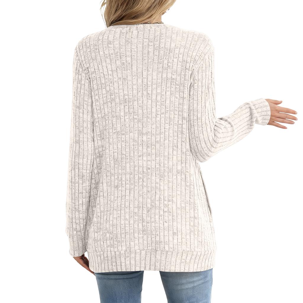 Tricou de damă la modă, cu croială largă, gât rotund, culoare uni, cu buzunar, cu mâneci lungi