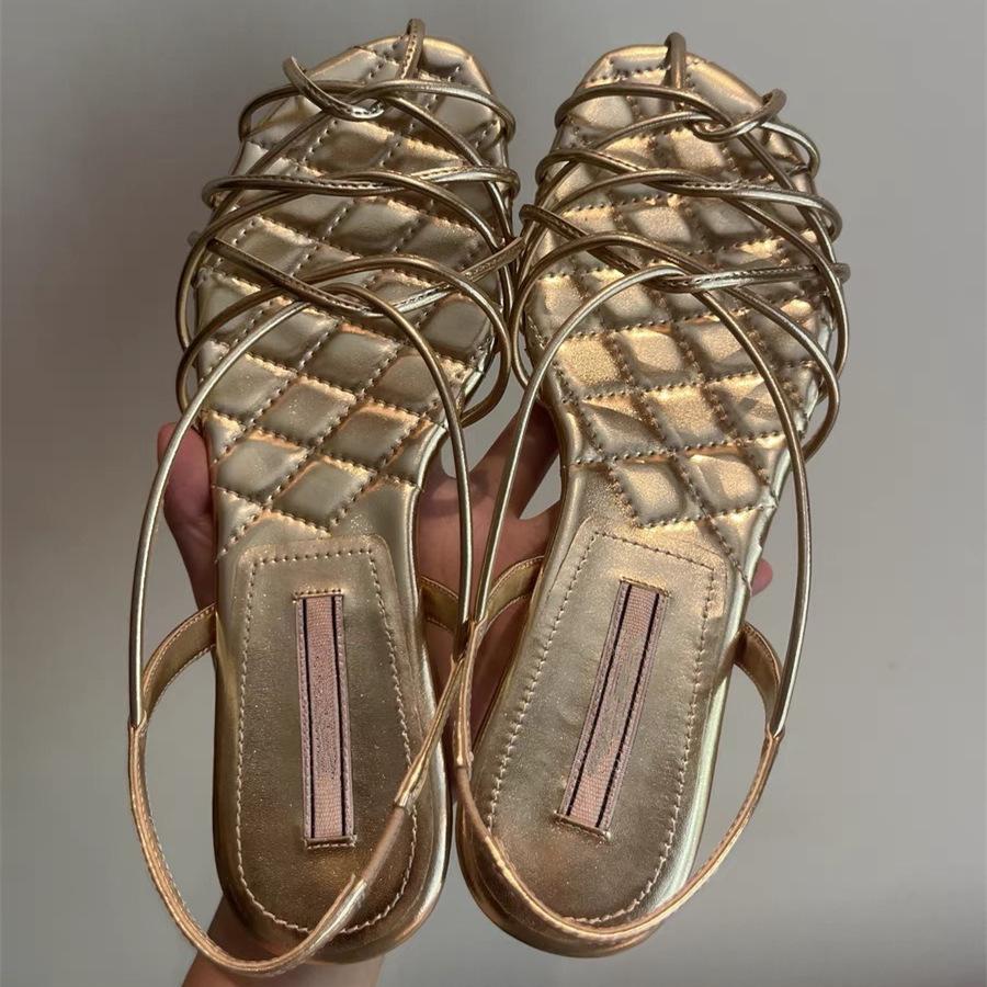Sheepskin~ Zhong Chuxi has the same alkaline water knot woven open-toed thin strap gold flat-bottomed Roman sandals for women's summer wear