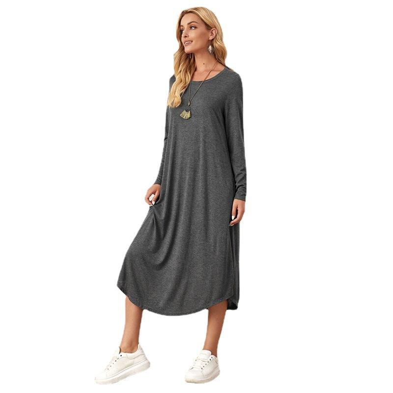 utumn  New European  women's solid color knitted side seam straight through pocket curved hem loose dress
