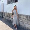 European and American women's solid color slanted shoulder sleeveless crop top, high waist pleated skirt two-piece set