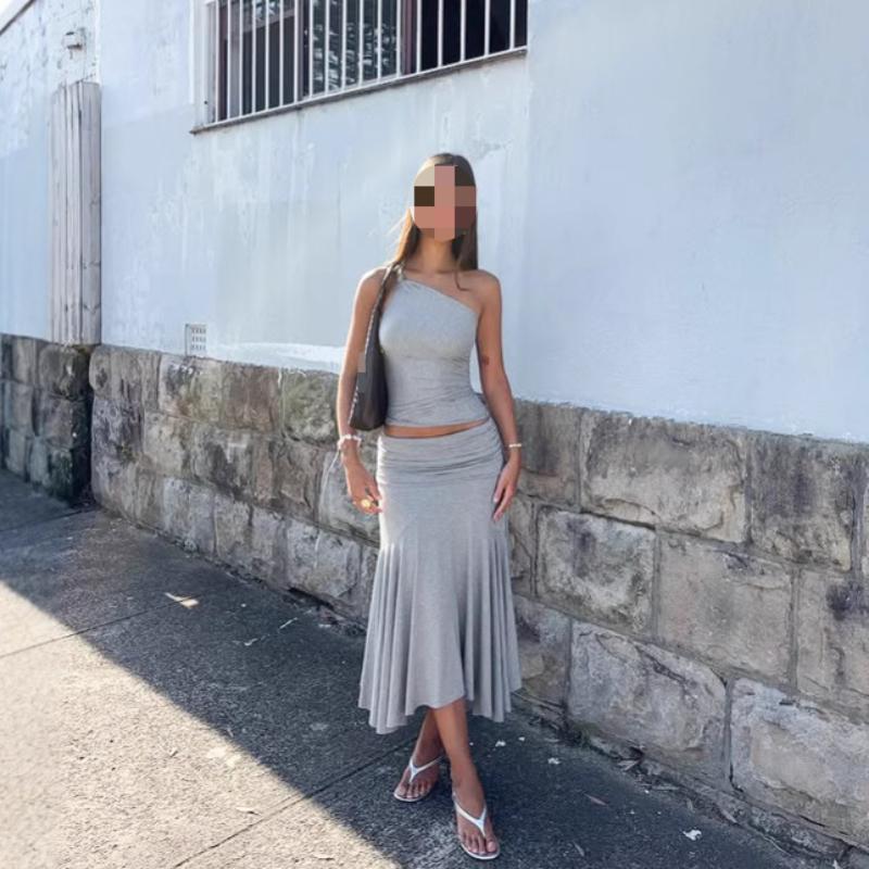 European and American women's solid color slanted shoulder sleeveless crop top, high waist pleated skirt two-piece set