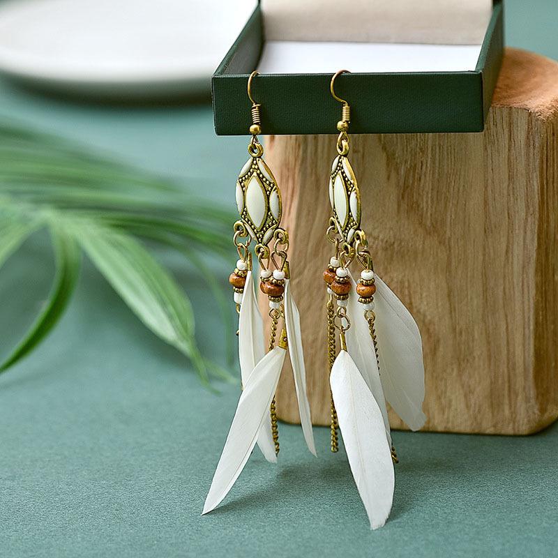 

European and American Retro Feather Leaf Tassel Earrings: Handmade Long Ear Hooks for Travel Photography