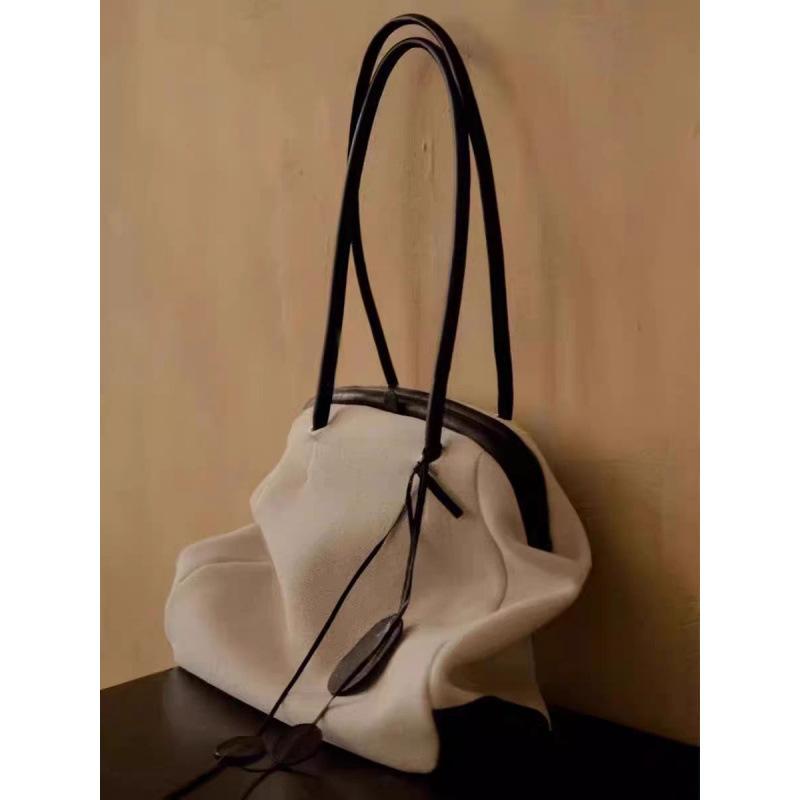 

Сумка-тоут женская новые модели популярны в этом году, нишевая лоскутная сумка через плечо в форме ракушки, ретро портативная дорожная сумка хаки