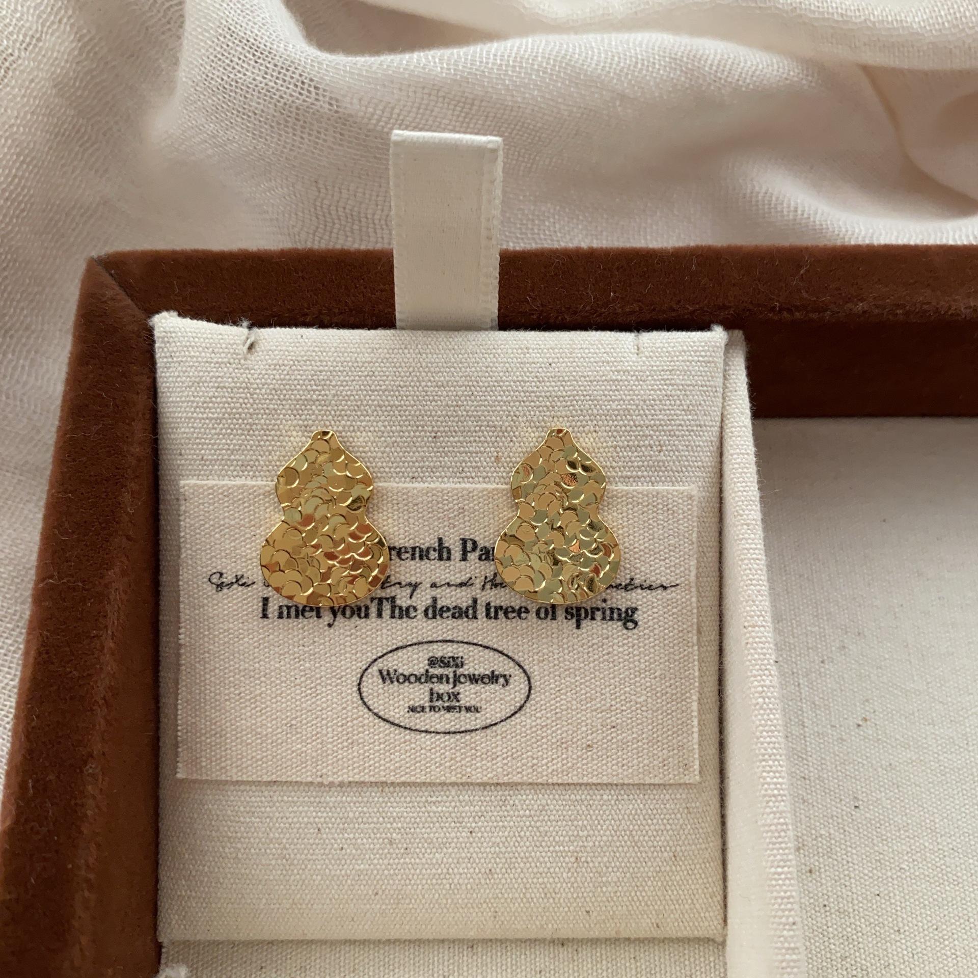 

Metal three-dimensional multi-geometric retro stud earrings, advanced light luxury design, exquisite and simple French temperament earrings