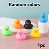 1 random colored mini pet sound toy in the shape of a duckling, squeaking sound