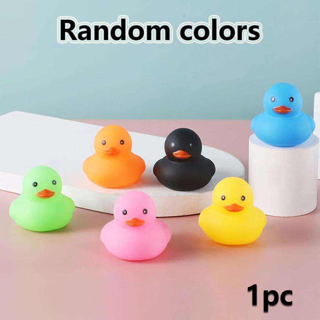 1 random colored mini pet sound toy in the shape of a duckling, squeaking sound