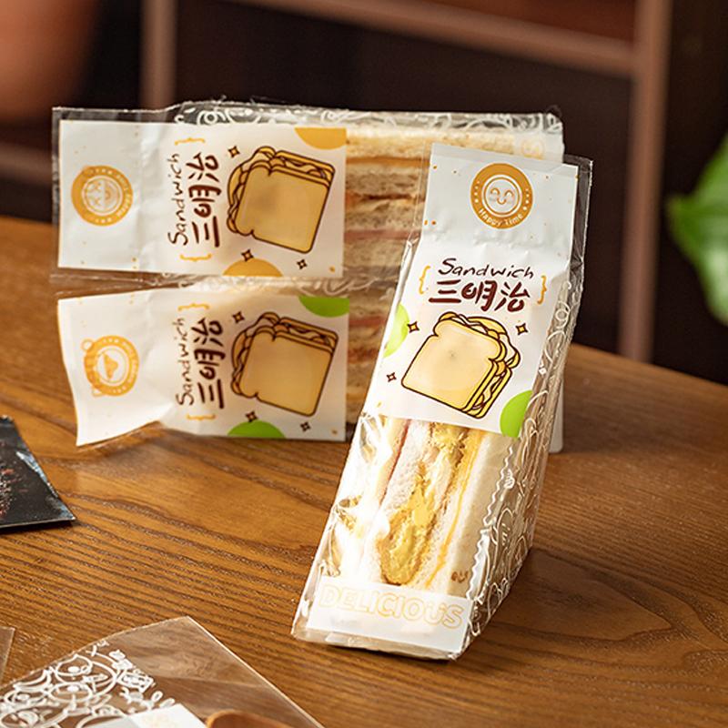 100 szt. Specjalne jednorazowe, łatwe do rozdarcia, przezroczyste trójkątne opakowania do pieczenia ciasta i chleba