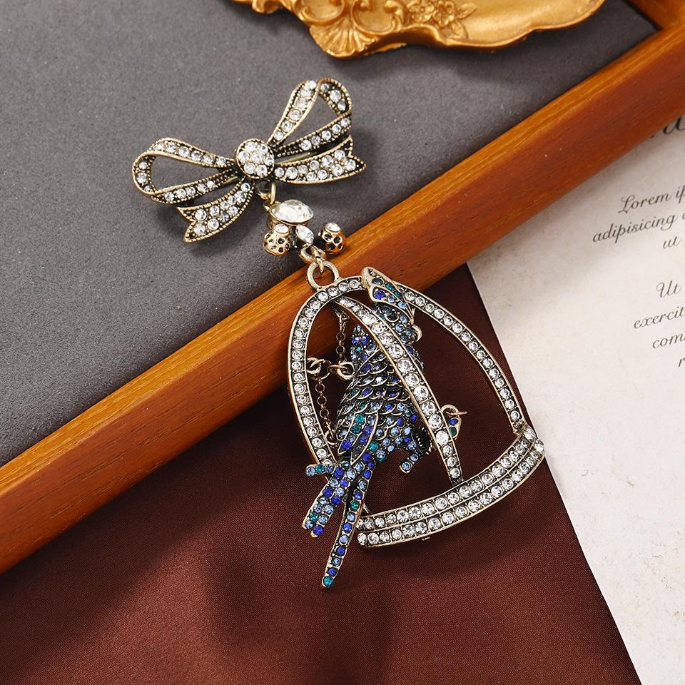 

Креативные Винтажные Полностью Хрустальные Подвески-Броши-Булавки в виде Птицы Птичьей Клетки для Женщин Леди Бант Ретро Стразы Блестящие Значки Ювелирные Изделия