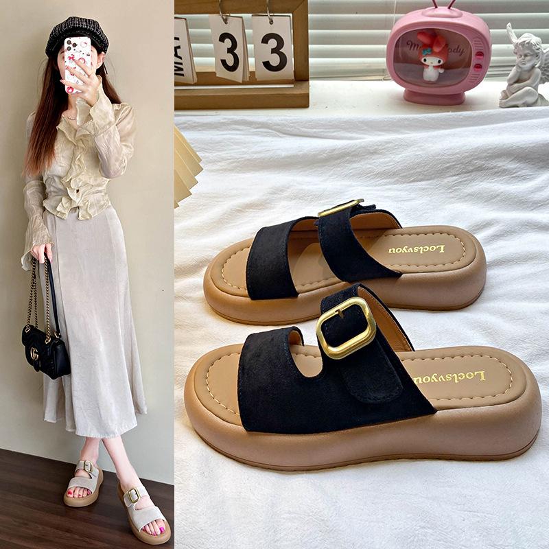 

Summer new casual one-word slippers, soft-soled flat-bottomed slippers, foreign buttons, sandals, cool slippers, women s shoes, large size. 42 чорний