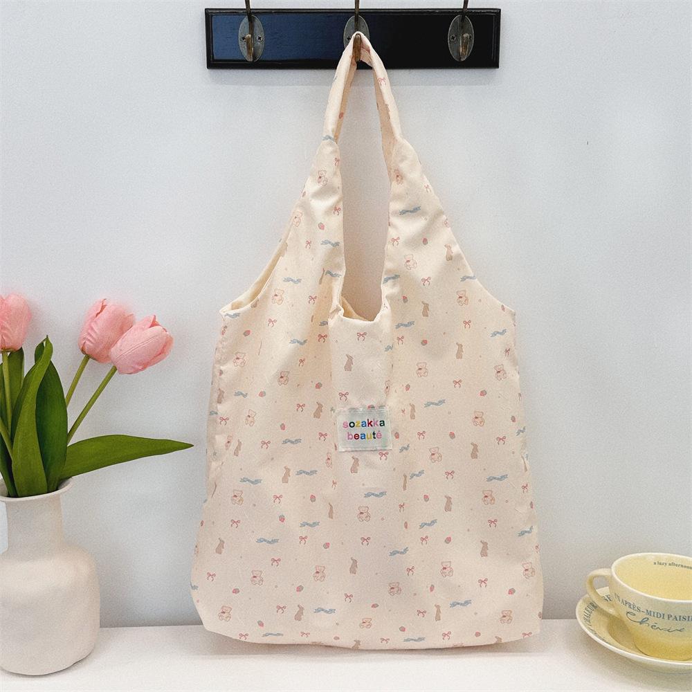 Korean Summer Embossed Canvas Tote Bag - Large Capacity, Niche Design, Shoulder and Underarm Style