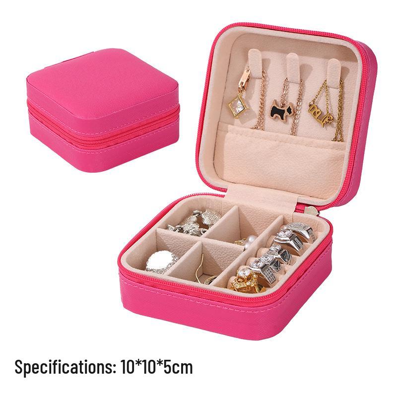 

Compact Crossgrain Leather Jewelry Box for Earrings, Rings, and Necklaces рожевий червоний колір