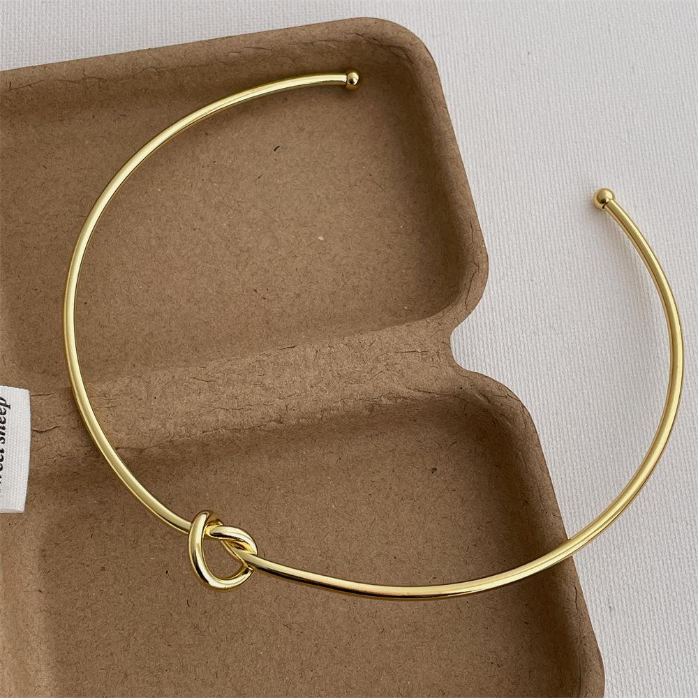 

Minimalist Hollow Out Knotted Open Adjustable Torques For Women 18K Gold Silver PVD Plated Stainless Steel Choker