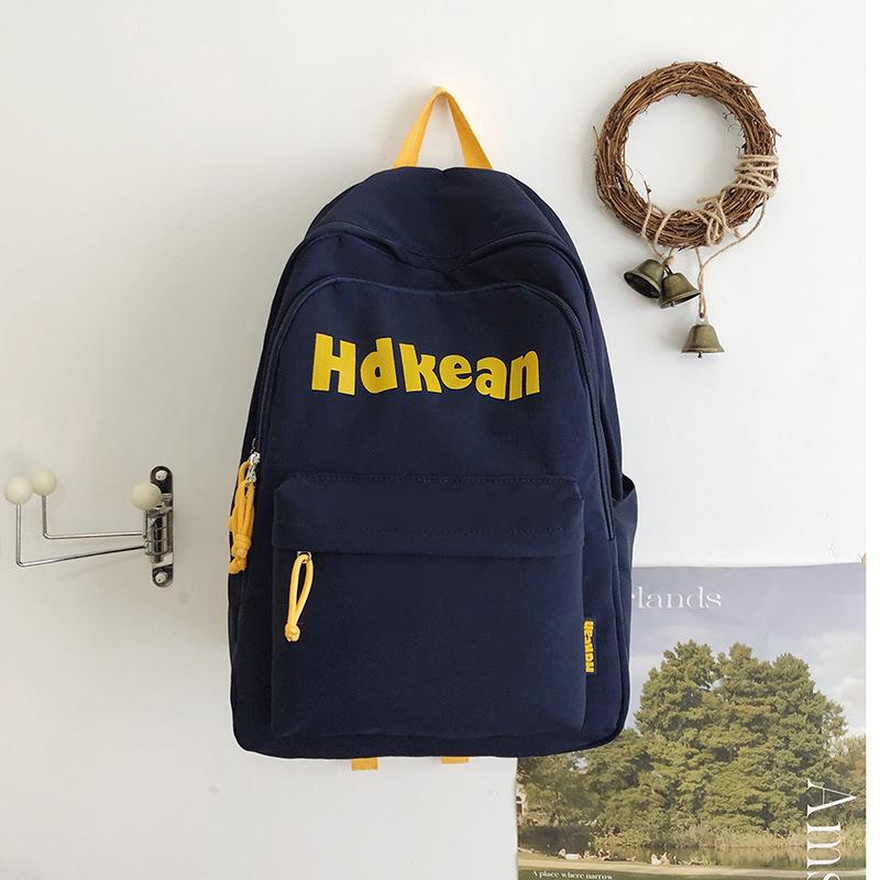 New High-value Solid Color Simple Letter Backpack Couple Casual Lightweight Large-capacity Backpack