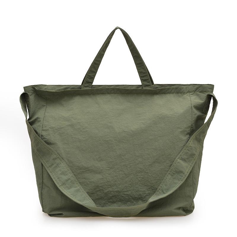 

New solid color versatile messenger bag large-capacity student class canvas bag Japanese light and simple shoulder bag women зелений