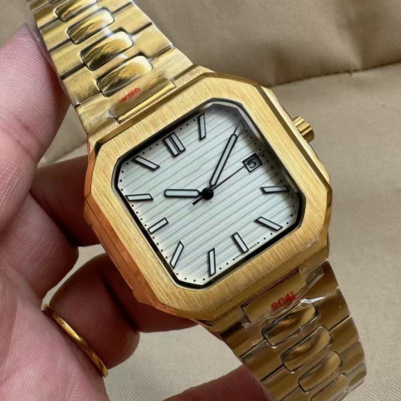Patek Philippe Nautilus 5821 Men's Gold Automatic Mechanical Watch with Large Dial and Calendar.