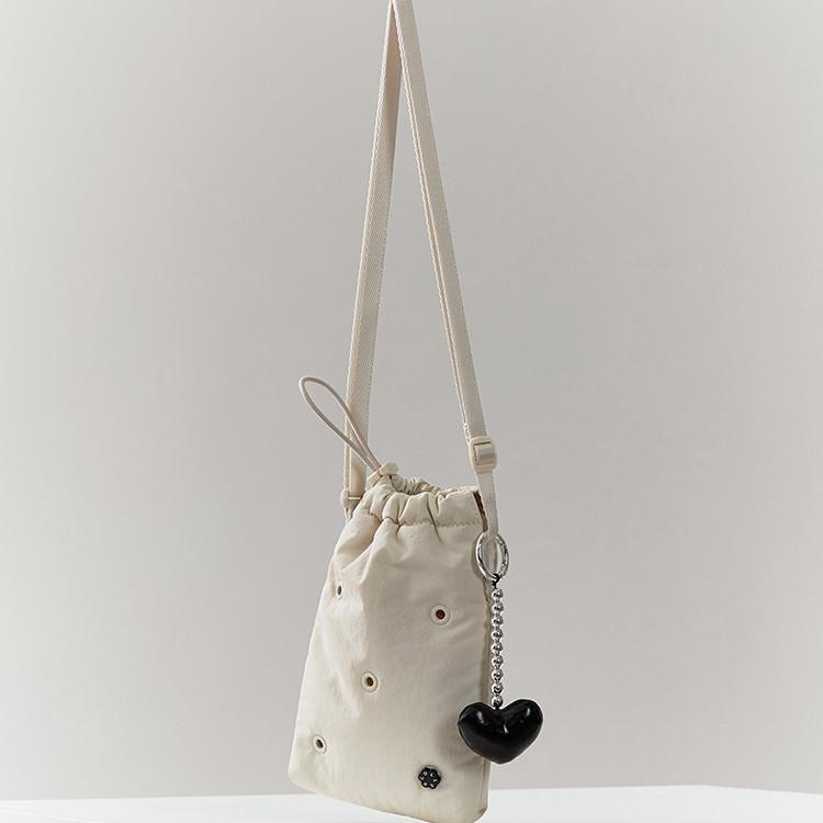 

Collet Puffer Cross Bag Oat Cream