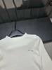 2026 Spring Round Neck Knit Long Sleeve Casual Top with Brooch