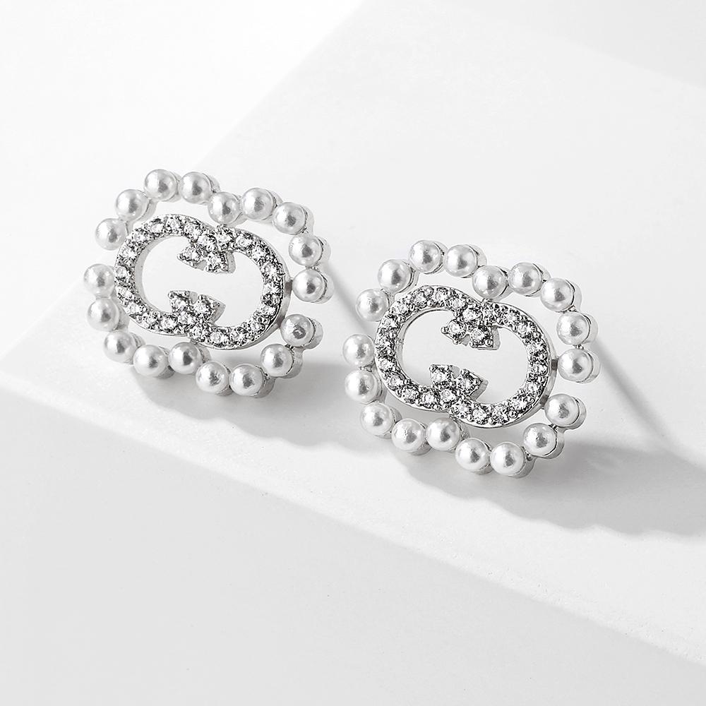 

ZAKOL Geometric Hollow 8 Shaped Imitation Zircon CZ Earrings Temperament Buling Zircon Party Zircon Accessories