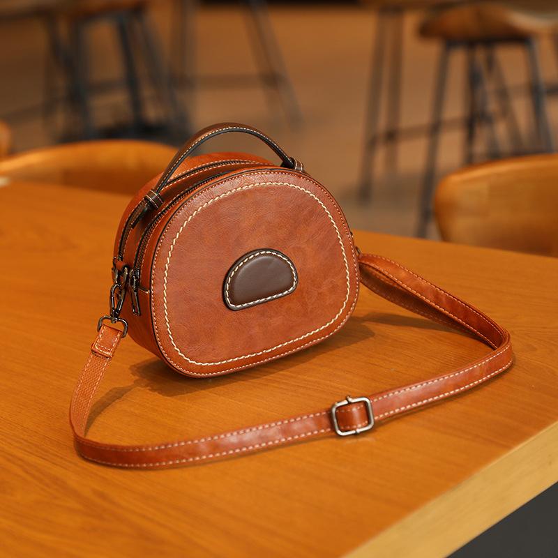New Small Round Bag with Large Capacity  High End and Fashionable Women's Hand Held Crossbody Bag