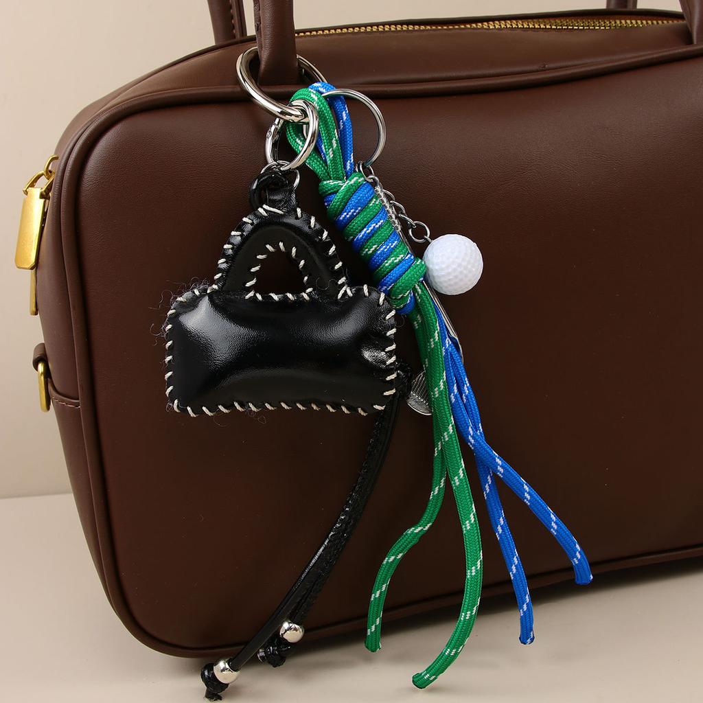 It is the original design of ins wind laser leather, high-end exquisite small bag pendant, keychain, schoolbag pendant.