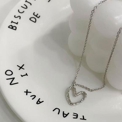 Wrinkled Lava Heart-shaped Necklace with Hollowed Out Heart-shaped Pendant, Collarbone Chain, Niche Design, Temperament