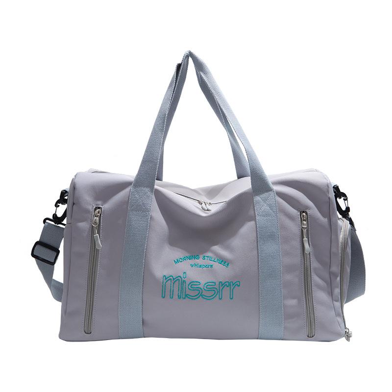 

Women s lightweight travel bag, new model for business trips, portable for tourism, simple sports and fitness training luggage bag 45*24*28 серый