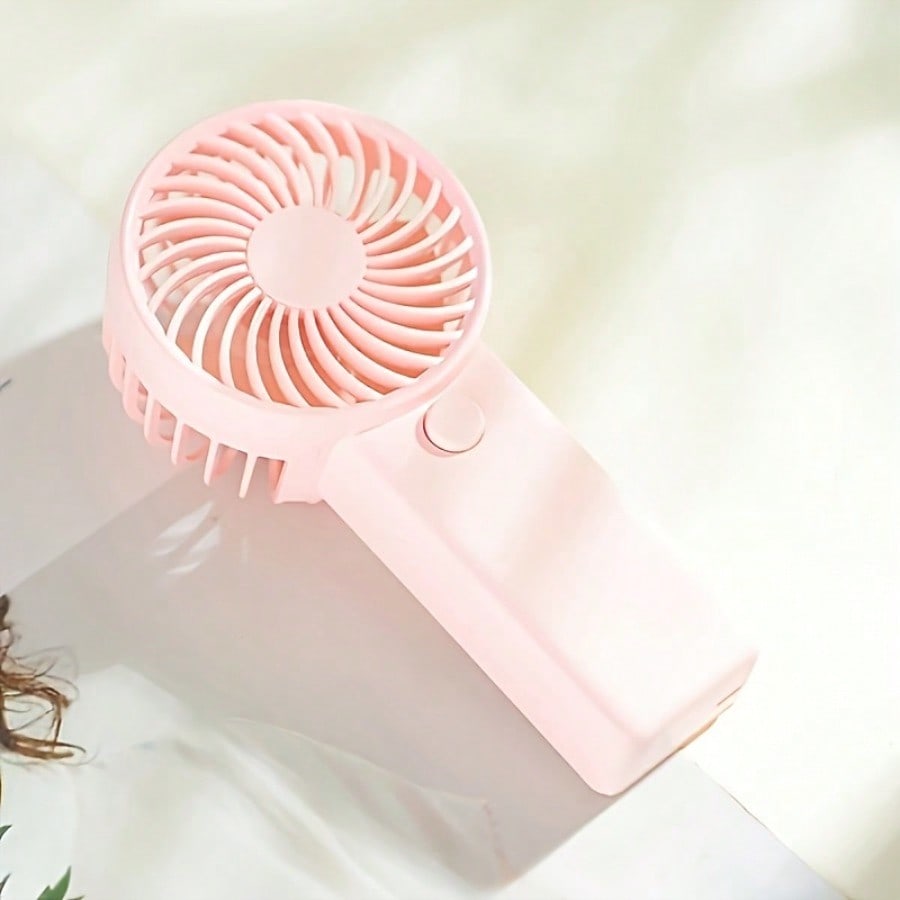 

1pc Mini Handheld Fan - Portable Lightweight Battery-Powered Cooling Fan with High-Speed Quiet Operation рожевий