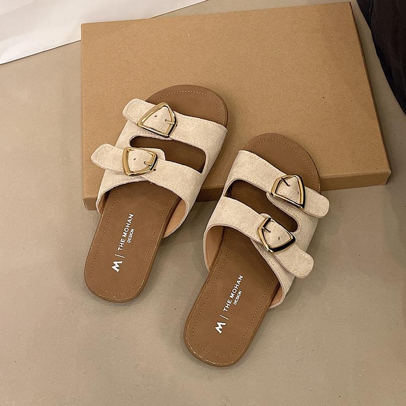 Internet celebrity flat bottom one-word shoes women's summer new flat heel soft sole casual outer wear buckle lazy versatile cool slippers