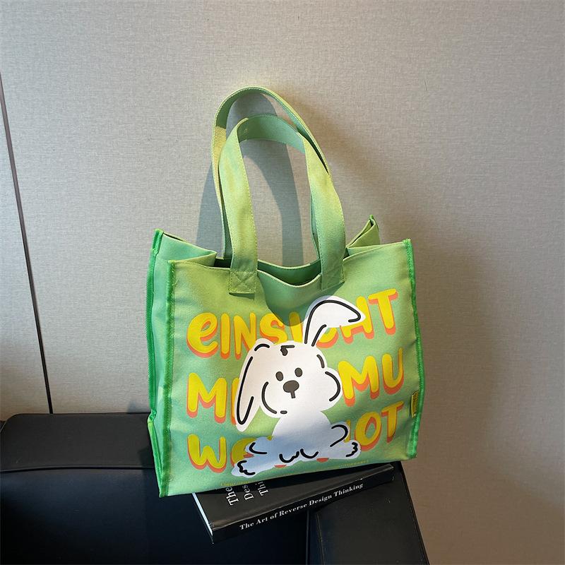 

Summer cartoon shoulder bag women s new trendy cute shoulder bag letter printed commuter tote bag зелений