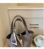 Trendy Cross-Buckle Bucket Bag: Versatile, High-End Fashion Handbag